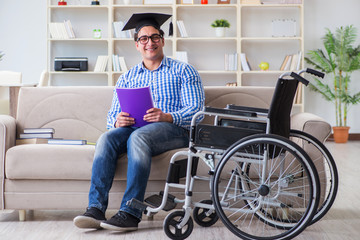 Young student on wheelchair in disability concept