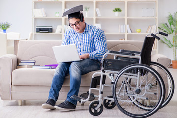 Young student on wheelchair in disability concept