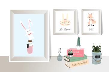 animal frame with rabbit,fox on the wall.Book and cactus on the table