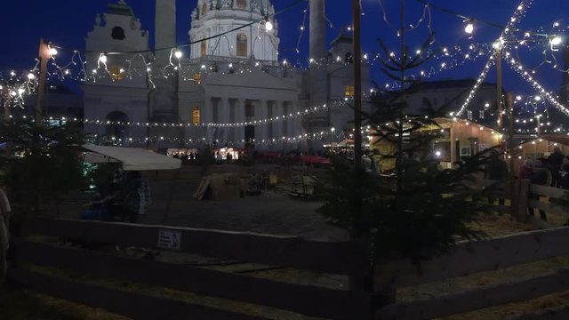 Parents and children riding old rickshaws