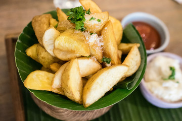 Roasted potato and sauce tomato.