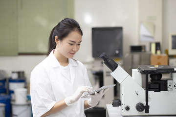woman asian engineer or chemistry doing chemical test in laboratory, science and research concept