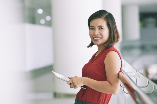 Pretty business lady with digital tablet