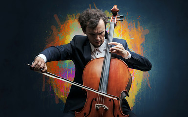 Young classical musician with colorful splotch wallpaper
