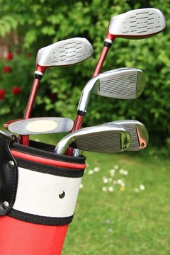 golf clubs with green background stock photo