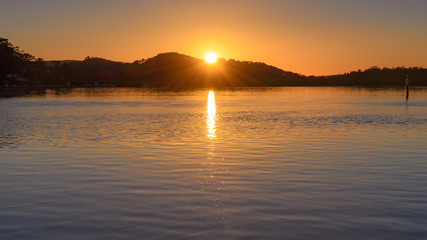 Sunrise Waterscape with Sunburst