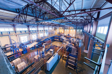 Fiberglass production industry equipment at manufacture background