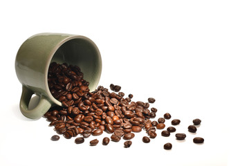 Coffee beans in coffee cup isolated on white background