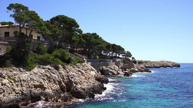 Beautiful view of rocky coast on Majorca island, seaside of Cala Ratjada, Mediterranean Sea Spain