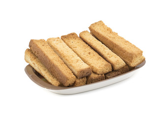 Fototapeta na wymiar Indian Bakery Food Tea Time Sweet Dry Toast Snack Also Know As Indian Toast Snack, Toasted, Bread, Long Toast, Mawa Toast isolated on White Background