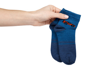 Cotton kid socks with hand, isolated on white background