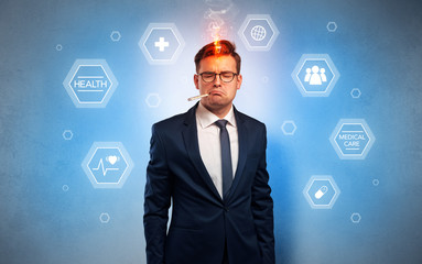 Young businessman with medical care, pills concept
