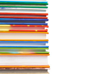 Different colorfull books in stack isolated on white background, copy space