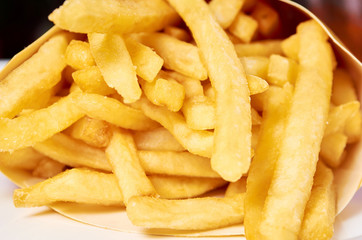 French Fries in box background. Fast food photo
