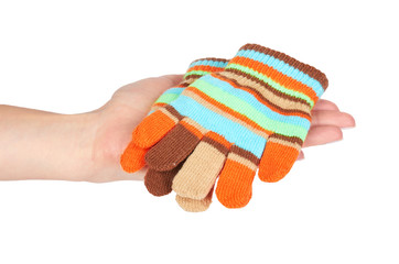 Kid knitted gloves with hand, isolated on white background