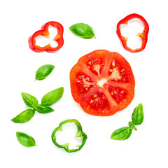 Colorful food pattern made of red pepper, onion, tomatoes and basil leaves. Flat lay. 