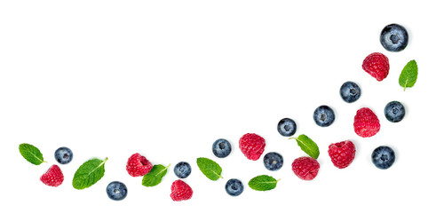 Creative row with various fresh berries isolated on white background, top view. 
