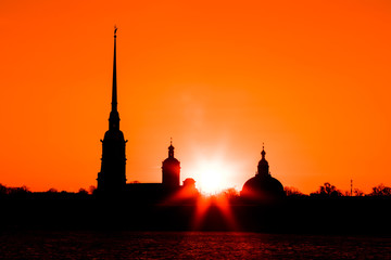 Peter and Paul Fortress of St. Petersburg, Russia in the rays of setting sun. The Peter and Paul...