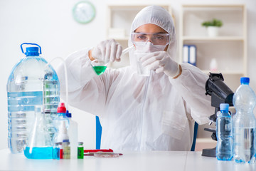 Lab assistant testing water quality