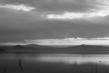 Fototapeta premium Trasimeno lake (Umbria) at dusk, with soft tones in the sky and water