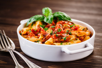 Penne with meat, tomato sauce and vegetables