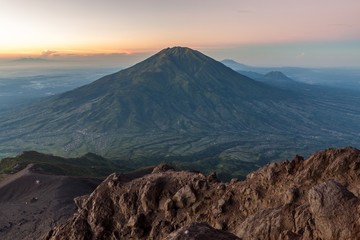 Green Merbabu volcano viewed from Merapi mountain, Java, Indonesia.
