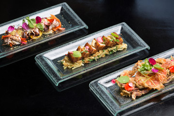 Different appetizer and anti pasti. Sea food platter Tapas and bites food concept. Shrimp, octopus, crab