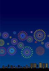 夜空に花火と街並み