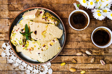 Halva with pistachio served with coffee