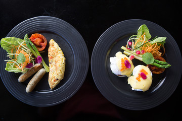 Breakfast served of juice, coffee, egg and omelette. Balanced diet