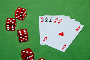 Casino. Bones for poker, chips on a green velvet table
