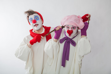 mime boy strangles mime girl. Domestic violence. Mockery. Human emotions