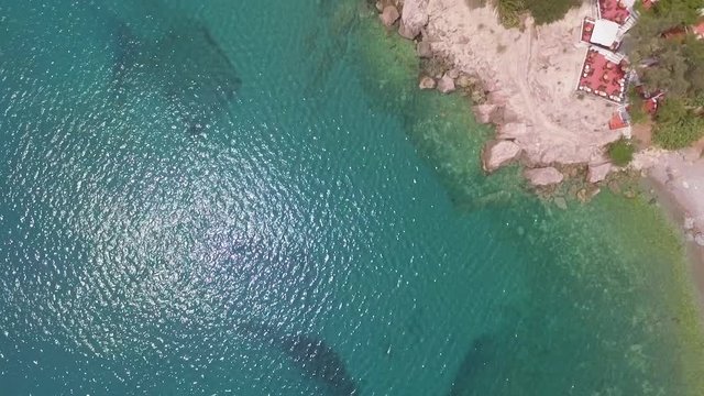 Aerial drone footage over sea at the Greek city of Tolo