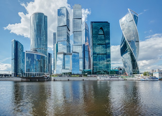 Skyscrapers on the river in Moscow on a summer day