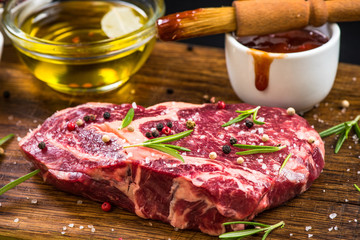 BBQ beef raw meat with glaze and spices