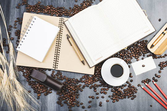 Contemporary tabletop with notepad and coffee