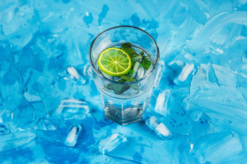 lemonade or cocktail of citrus with mint and ice