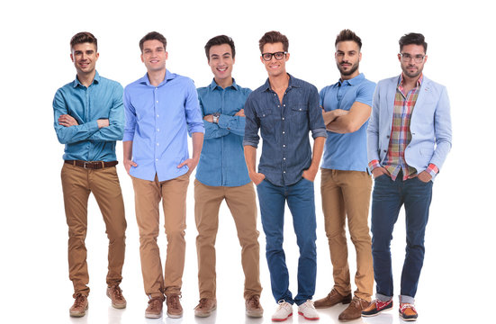 group of six young casual men standing confidently