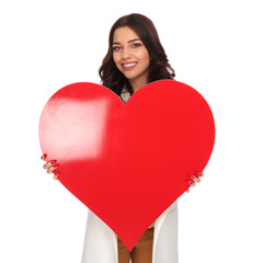 businesswoman in love holds a red valentine's day heart