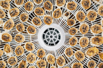 Homemade Dehydrated Bananas. Macro photo of dried fruit. Healthy food. Drying is the way to preserve the useful properties.