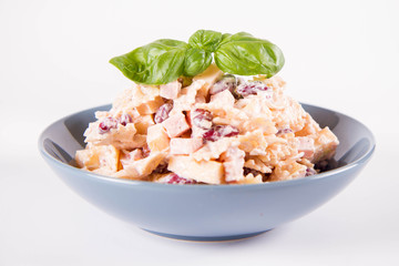 Pasta salad with cheese, ham, kidney beans and mayonnaise