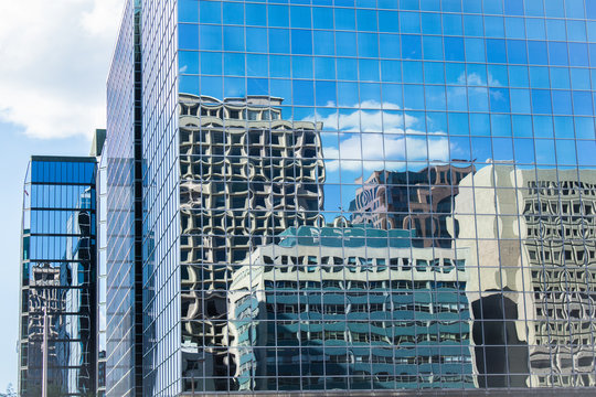 Windows of Skyscraper Business Office, Reflection of Corporate building in downtown