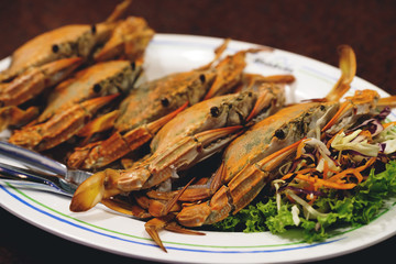 Stream sea crab on white dish