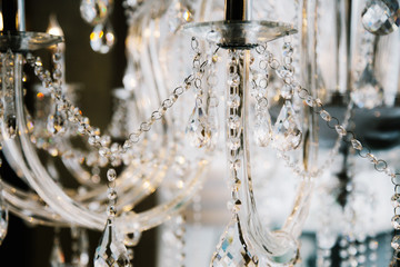 Crystal chandelier close-up. Glamour background with copy space