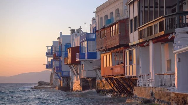 Picturesque houses of Little Venice in Mykonos Island closeup at sundown, Cyclades, Greece