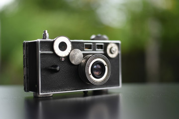 Old camera on the table.