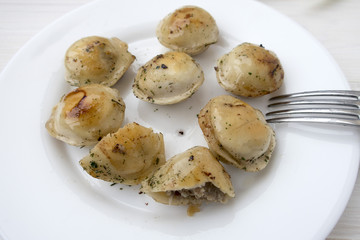 Fried dumplings on a plate.