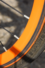Bicycle wheel old orange color close up