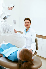 Obraz premium Dentistry. Dentist Doctor And Patient In Clinic