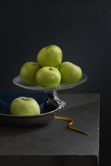 Still life with green apples